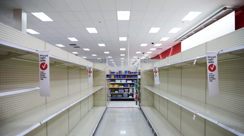 Shelves at the Target department store in Wadsworth, Ohio, were emptied of toilet paper and sanitizer a day after Ohio Gov. Mike DeWine put in place a stay-at-home orders. Photo for The Washington Post by Dustin Franz.