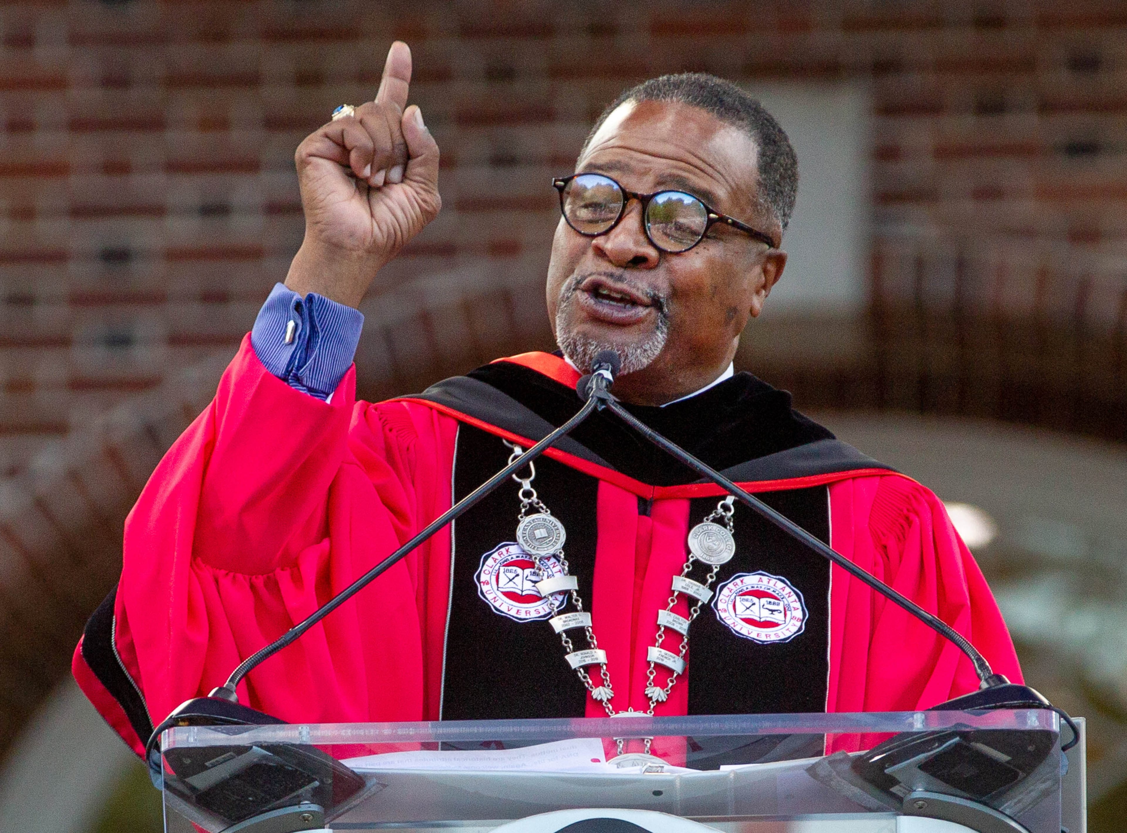Clark Atlanta University President George T. French Jr. — pictured speaking at graduation in 2021 — called the scholarship program a "transformative gift." (Steve Schaefer for the AJC 2021)