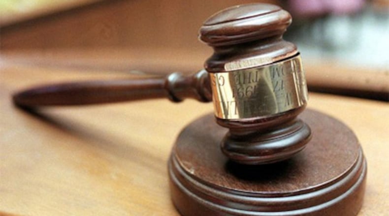 Twenty-five residents of Walton County were indicted on federal drug and gun charges, a spokeswoman said.