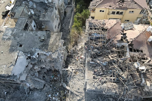 Destroyed residential buildings that was hit by a missile fired from Iran is seen in Ramat Gan, near Tel Aviv, Israel on Saturday, June 14, 2025. (AP Photo/Ariel Schalit)