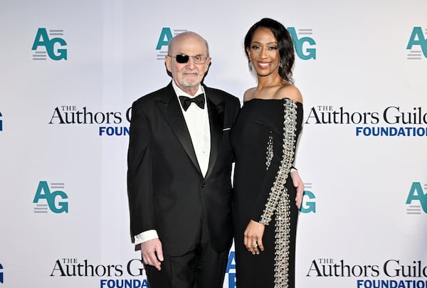 Honoree Salman Rushdie, left, and wife Rachel Eliza Griffiths attend the Authors Guild Foundation Dinner at Gotham Hall on Monday, April 7, 2025, in New York. (Photo by Evan Agostini/Invision/AP)