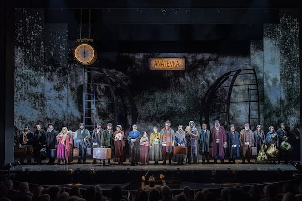 The ensemble of "Fiddler on the Roof," directed by Tomer Zvylun, the Atlanta Opera’s general and artistic director. Costumes are by Vita Tzykun, scenic design by Alexander Lisiyansky.  (Photo credit: Raftermen)