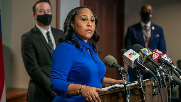 Fulton County District Attorney Fani Willis is considering whether to seek criminal charges against former President Donald Trump, still a favorite with Georgia Republicans, over his attempt to overturn his loss in Georgia's 2020 presidential election. (Alyssa Pointer/Atlanta Journal-Constitution)