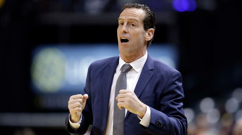 Brooklyn Nets head coach Kenny Atkinson gestures on the sideline during the first half of an NBA basketball game against the Indiana Pacers in Indianapolis, Thursday, Jan. 5, 2017. (AP Photo/Michael Conroy)