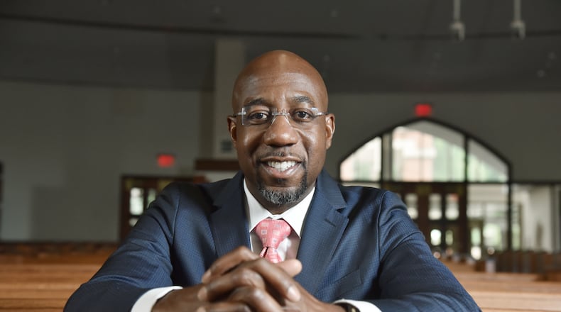 July 18, 2019 Atlanta - Portrait of Rev. Raphael Warnock at the Historic Ebenezer Baptist Church on Thursday, July 18, 2019. The Rev. Raphael G. Warnock has had busy couple of weeks. After co-hosting a conference on ending mass incarceration in the United States, he was off to Baltimore. And less than 24 hours ago, he was back at Ebenezer for the 45th annual scholarship concert honoring the memory of the late Christine Williams King, affectionately known as Mama King, who was assassinated there 45 years ago. (Hyosub Shin / Hyosub.Shin@ajc.com)