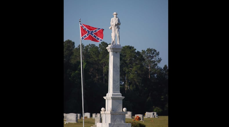 The figure standing atop the Confederate monument in the Screven County Memorial Cemetery at Sylvania resembles another Confederate statue in McDonough. Both were mass-produced by McNeel Marble Company in Marietta. This McNeel monument was dedicated in 1909.