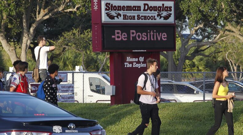 Students make their way to class on the first day of school at Marjory Stoneman Douglas Wednesday, Aug. 15, 2018 in Parkland, Fla. (Carl Juste/Miami Herald/TNS)