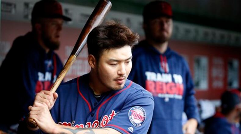 Minnesota Twins first baseman Byung Ho Park (52) prepares to bat during an exhibition baseball game against the Washington Nationals at Nationals Park, Saturday, April 2, 2016, in Washington. (AP Photo/Alex Brandon)