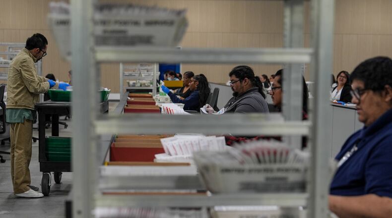 Ballots are inspected the day after California's primary election at the Los Angeles County Ballot Processing Center Wednesday, June 3, 2026, in City of Industry, Calif. (AP Photo/Jae C. Hong)