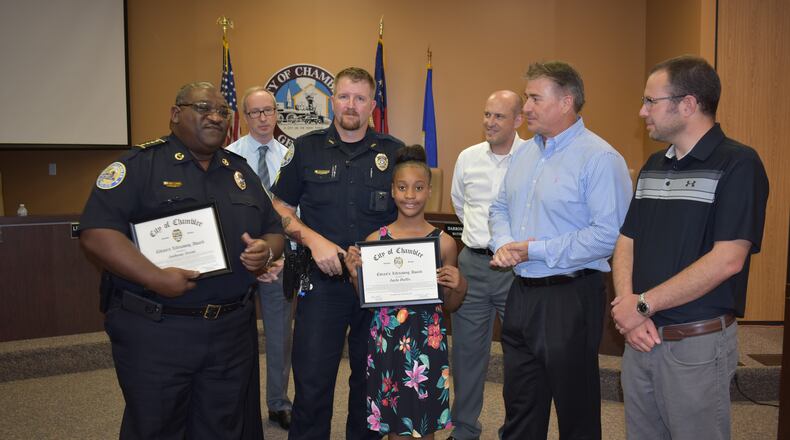 Jayla Dallis (center) was honored by the Chamblee City Council on Wednesday.