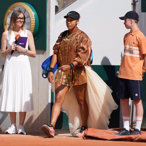 Naomi Osaka of Japan enters the court for the second round women's singles tennis match against Donna Vekic of Croatia at the French Open tennis tournament in Paris, Thursday, May 28, 2026. (AP Photo/Thibault Camus)