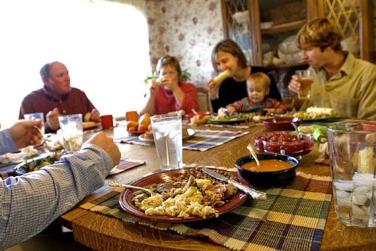 Everyone sits down for Sunday dinner at Carter and Beverly Swancy's home in Ranger, Ga. (Joey Ivansco/AJC)