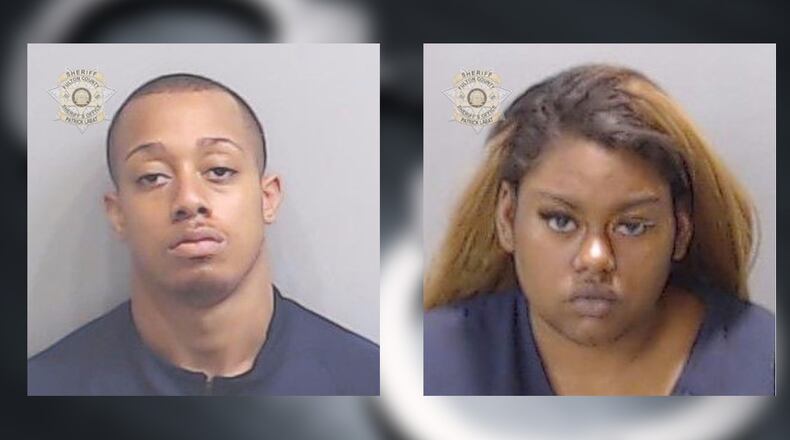 Daniel Wright (left) and T'Lani Robinson were each charged with murder related to the shooting death of 20-year-old Daniel Johnson near downtown Atlanta, police said.