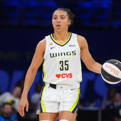 Dallas Wings guard Azzi Fudd dribbles during the first half of a WNBA basketball game against the Phoenix Mercury in Arlington, Texas, Thursday, June 11, 2026. (AP Photo/LM Otero)