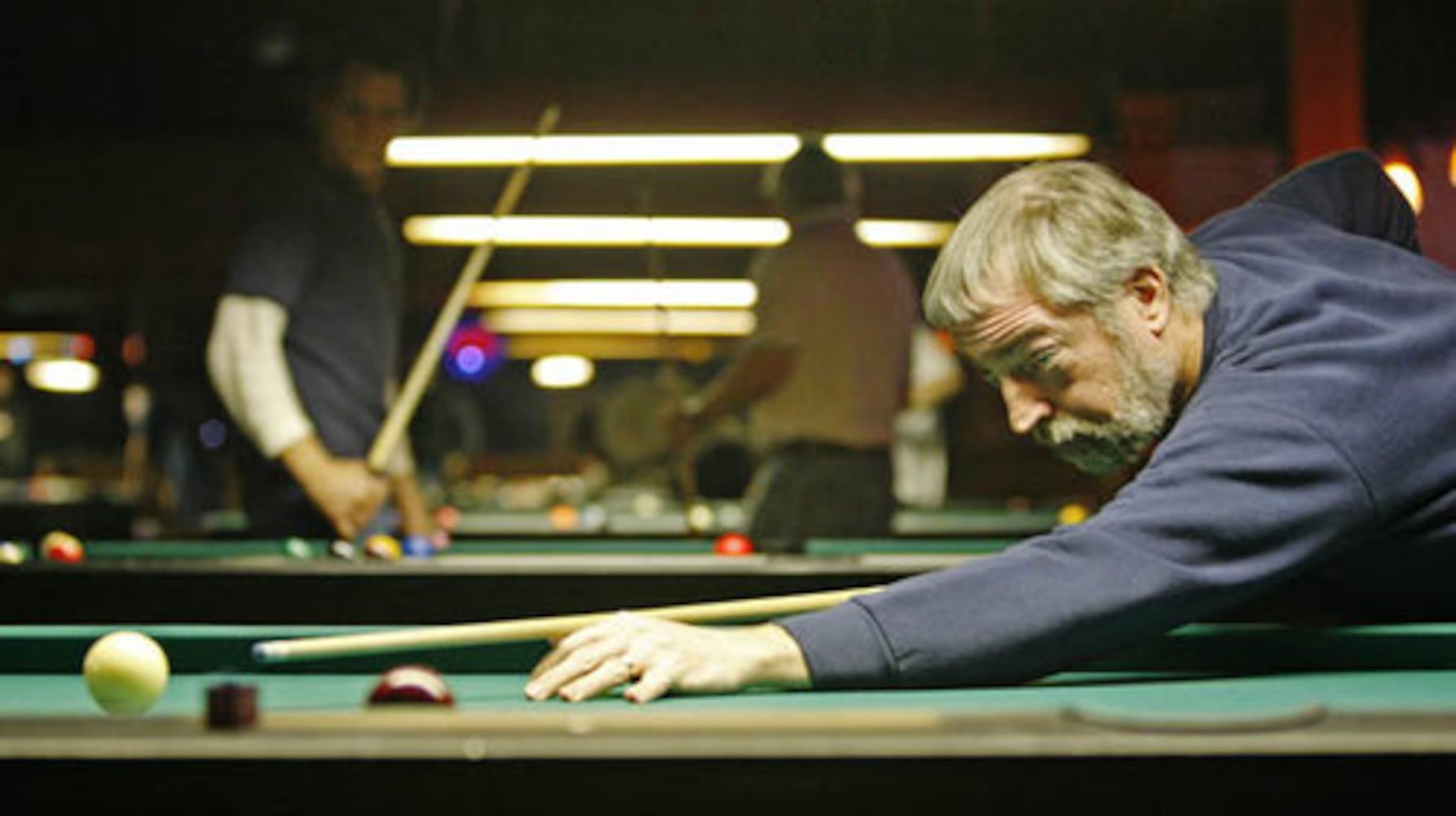 Pool hall offers solace in tough times