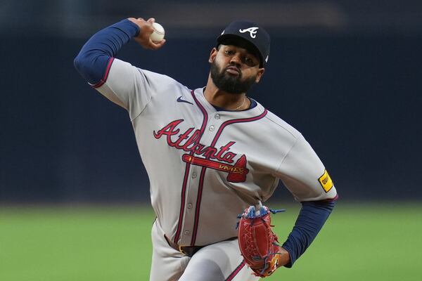 Atlanta Braves starting pitcher Reynaldo Lopez works against a San Diego Padres batter during the first inning of a baseball game Friday, March 28, 2025, in San Diego. (AP Photo/Gregory Bull)