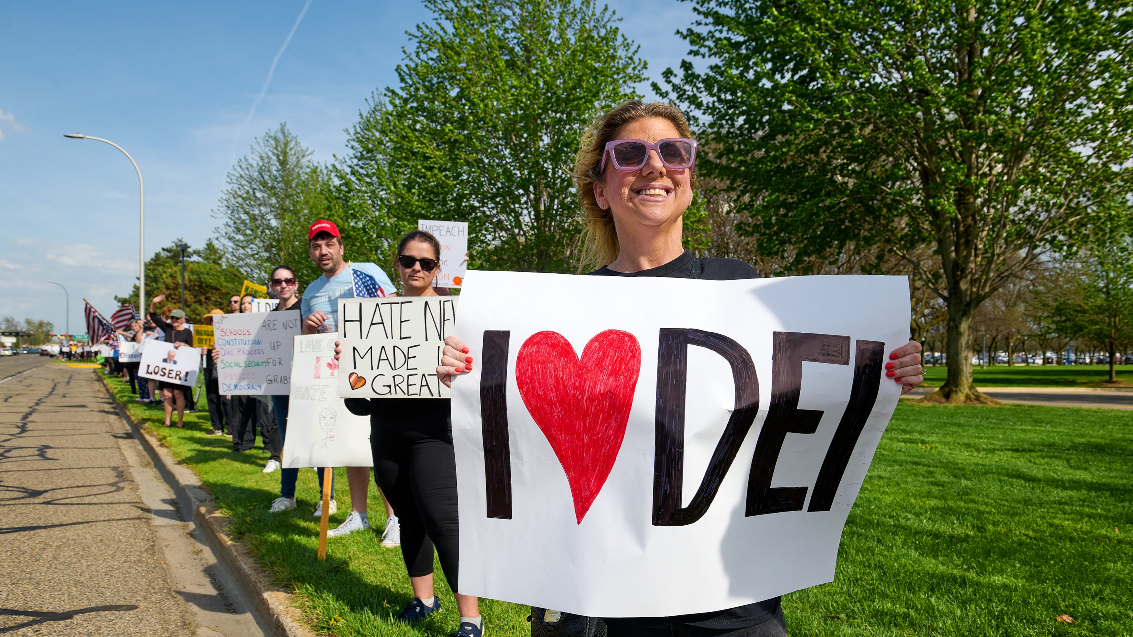 Hundreds protest outside a rally held by President Donald Trump in Warren, Mich., in April. (Dominic Gwinn/TNS)