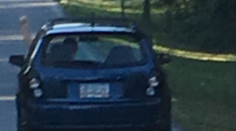 Investigators want to find the driver of this car after he allegedly stabbed another driver during a road-rage incident in Gwinnett County.
