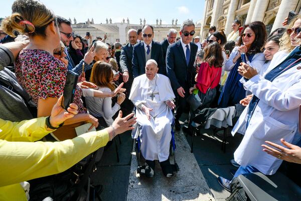 In this image released by Vatican Media, Pope Francis arrives in a wheelchair at the end of a mass in St. Peter's Square at The Vatican, Sunday, April 6, 2025, part of the Jubilee of the sick and the health workers. (Vatican Media via AP, HO)