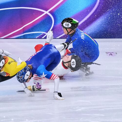 Kamila Sellier of Poland falls during the women's 1,500 meters short track speedskating quarterfinal at the 2026 Winter Olympics, in Milan, Italy, Friday, Feb. 20, 2026. (AP Photo/Stephanie Scarbrough)