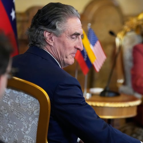 Venezuela's acting President Delcy Rodriguez, behind, and U.S. Interior Secretary Doug Burgum meet Miraflores presidential palace in Caracas, Venezuela, Wednesday, March 4, 2026. (AP Photo/Ariana Cubillos)