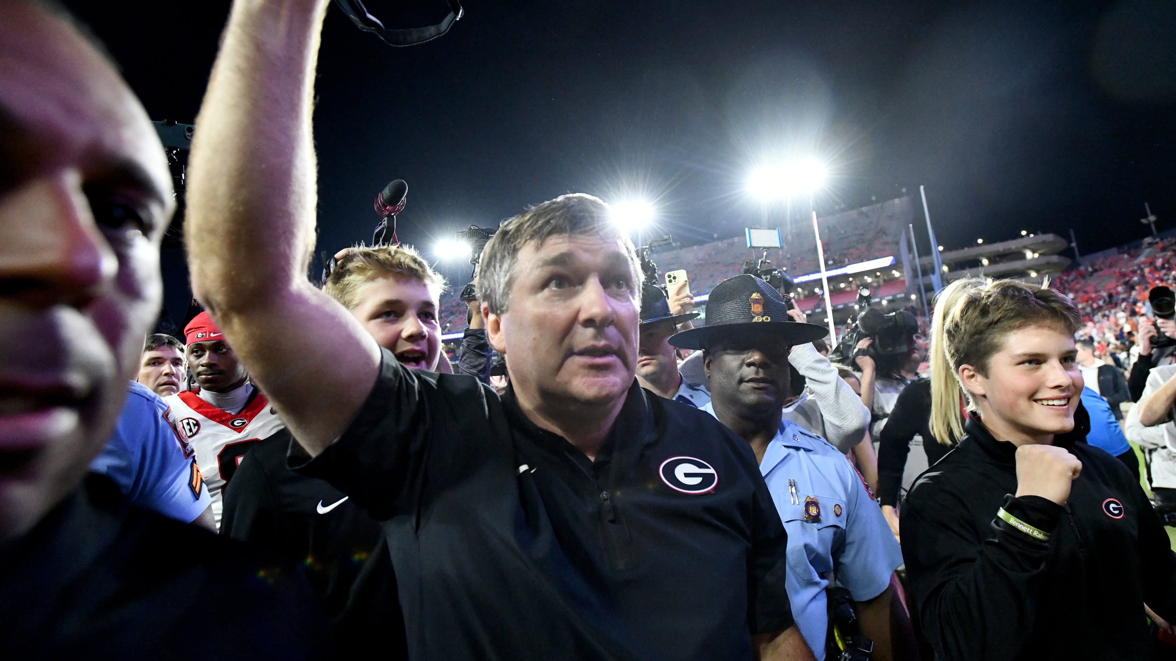 Georgia head coach Kirby Smart celebrates as he leaves the field after Georgia beat Auburn during a NCAA college football game at Jordan-Hare Stadium, Saturday, October 11, 2025, in Auburn, Ala. Georgia won 20-10 overAuburn. (Hyosub Shin / AJC)
