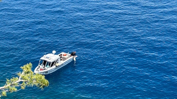 Authorities conduct searches along the shore at D.L. Bliss State Park after a weekend incident in which a boat capsized, killing several people, on Monday, June 23, 2025, in South Lake Tahoe, Calif. (AP Photo/Brooke Hess-Homeier)