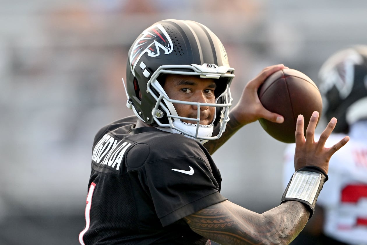Falcons quarterback Tua Tagovailoa throws during a Saturday Night Lights practice at Lanier High School on Saturday, Aug. 8, 2026, in Sugar Hill. Tagovailoa will start in Friday’s preseason game against the Broncos. (Hyosub Shin/AJC)