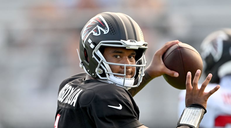 Falcons quarterback Tua Tagovailoa throws during a Saturday Night Lights practice at Lanier High School on Saturday, Aug. 8, 2026, in Sugar Hill. Tagovailoa will start in Friday’s preseason game against the Broncos. (Hyosub Shin/AJC)