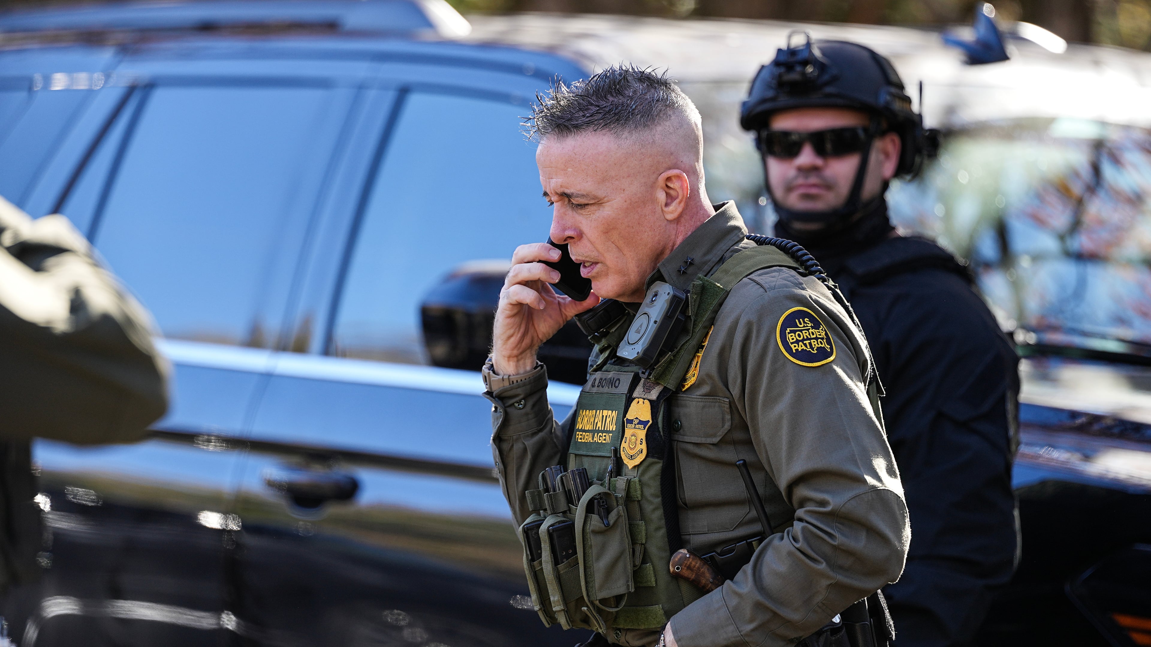 U.S. Border Patrol Commander at large Gregory Bovino takes a phone call, Monday, Nov. 17, 2025, in Charlotte, N.C. (AP Photo/Matt Kelley)