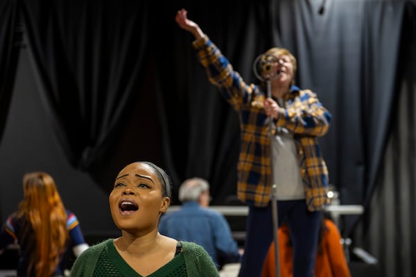 Anny Jules (left), playing Mrs. Neilsen, and Jill Hames, playing Elizabeth Laine, perform during a dress rehearsal for "Girl from the North Country" on Thursday, Jan. 22, 2026, in Atlanta. (Olivia Bowdoin for the AJC)