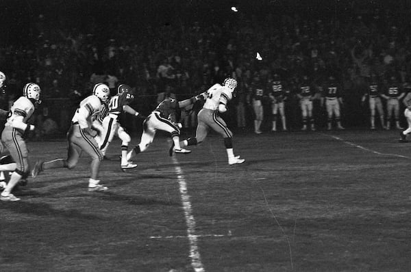 Herschel Walker breaks away for a Johnson County touchdown in 1979. (Kenneth Walker/AJC file)