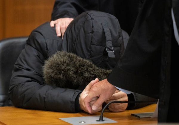 A Syrian doctor, accused of torture and war crimes in his Syrian homeland, sits in the Higher Regional Court before the verdict is announced in Frankfurt, Germany, Monday, June 16, 2025. (Boris Roessler/dpa via AP)