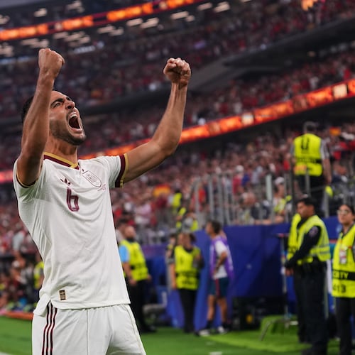 Spain's Mikel Merino (6) celebrates scoring his side's opening goal during the World Cup round of 16 soccer match between Portugal and Spain in Arlington, Texas, near Dallas, Monday, July 6, 2026. (AP Photo/Julio Cortez)