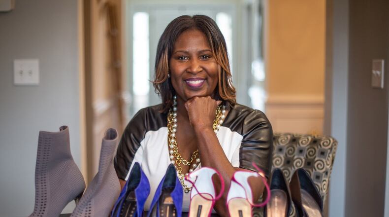 Though Phyllis C. Starks still loves shoes, the Cobb County woman spends her money more wisely now — and focuses more on saving and investing it — than when she spoke to an Atlanta Journal-Constitution reporter for a story in 1995. STEVE SCHAEFER / SPECIAL TO THE AJC