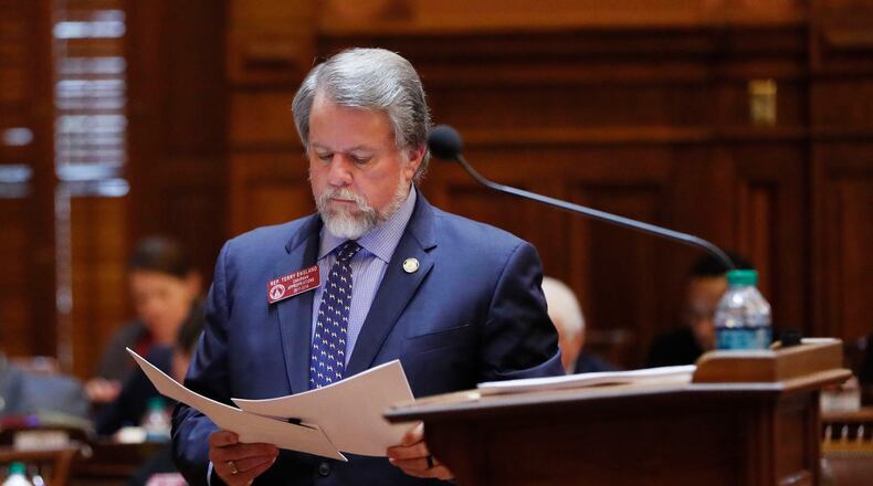 3/1/2018 - Atlanta - Rep. Terry England, R - Auburn, prepares to present the mid-year budget.  The House approved a new and improved mid-year budget Thursday that would spend $8 million to furnish and equip the new state courthouse, $10 million for new technical college equipment, $1.6 million for coastal Georgia dune restoration, and almost $30 million to help local governments. Legislative photos from today, the 29th day of the 2018 General Assembly.  BOB ANDRES  /BANDRES@AJC.COM