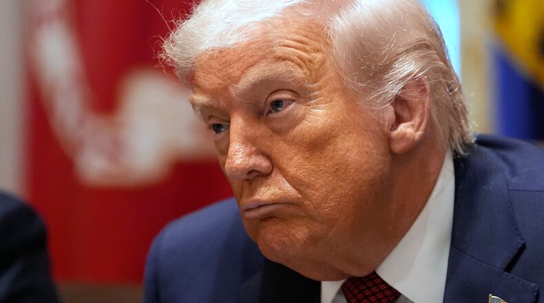 President Donald Trump listens during a roundtable on farm subsidies in the Cabinet Room of the White House, Monday, Dec. 8, 2025, in Washington. (AP Photo/Alex Brandon)