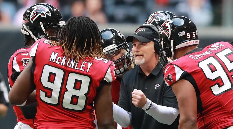 October 14, 2018 Atlanta: Atlanta Falcons head coach Dan Quinn talks with his defense during a first half time out against the Tampa Bay Buccaneers in a NFL football game on Sunday, Oct 14, 2018, in Atlanta. Curtis Compton/ccompton@ajc.com