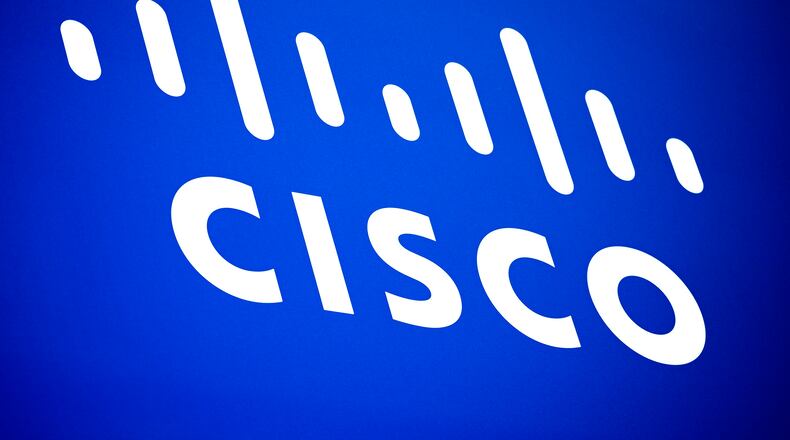 FILE - Cisco logo is seen at the Mobile World Congress 2023 in Barcelona, Spain, March 2, 2023. (AP Photo/Joan Mateu Parra, File)