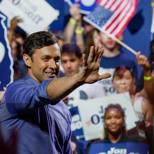 U.S. Sen. Jon Ossoff waves to a supporter after speaking at a campaign rally at the Center Stage Theater earlier this month. (Miguel Martinez/AJC)