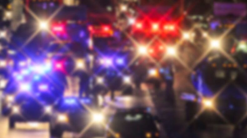 Although many motorists complain about headlight glare, maintaining the lenses and turning off high beams can help. (John Spink/AJC 2024)