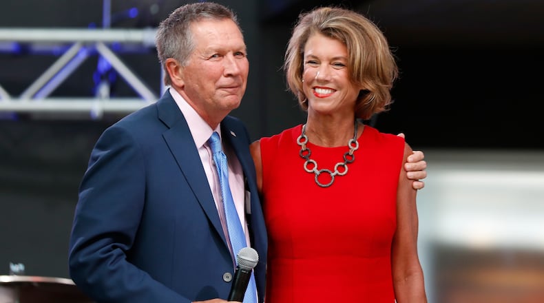 Ohio Gov. John Kasich, left, arrives with his wife Karen at the The Rock and Roll Hall of Fame and Museum on Tuesday, July 19, 2016, in Cleveland, during the second day of the Republican convention. AP/Alex Brandon