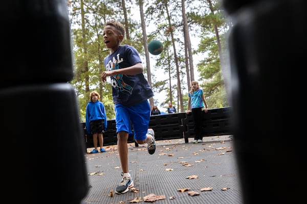 Fifth grader Prince Calloway (center) plays gaga ball at Laurel Ridge Elementary School in Decatur on Tuesday, Oct. 7, 2025. (Arvin Temkar/AJC)