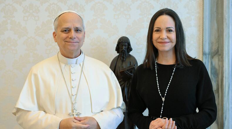 This image released by Vatican Media shows Pope Leo XIV meeting with Nobel Peace Prize laureate María Corina Machado of Venezuela, right, inside his private library at the Vatican, Monday, Jan. 12, 2026. (Vatican Media via AP, HO)