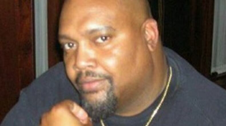 Michael Tanks starred at Southwest DeKalb in the early 1980s and became head coach of his alma mater in 2013.