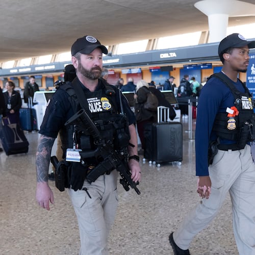 FILE - Department of Homeland Security, Transportation Security Administration, Federal Air Marshals, patrol around Washington Dulles International Airport, in Chantilly, Va., Tuesday, March 24, 2026. (AP Photo/Manuel Balce,File)
