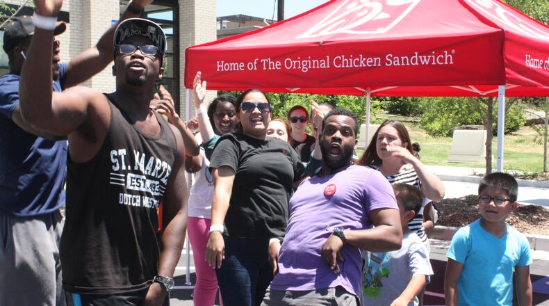 Chick-fil-A fans having fun at camp out for new Glenwood Place store.
