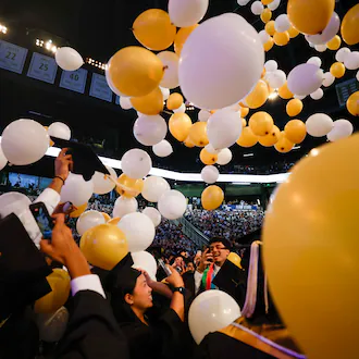Georgia Tech graduates celebrate at the end of their commencement ceremony at the McCamish Pavilion on Thursday, May 7, 2026, in Atlanta. Universities across the state are increasingly offering more AI classes in hopes of preparing students for a changing job market. (Miguel Martinez/AJC)