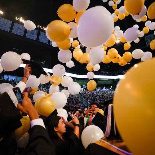 Georgia Tech graduates celebrate at the end of their commencement ceremony at the McCamish Pavilion on Thursday, May 7, 2026, in Atlanta. Universities across the state are increasingly offering more AI classes in hopes of preparing students for a changing job market. (Miguel Martinez/AJC)