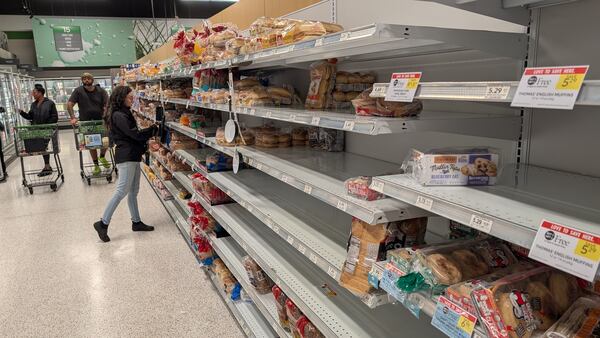 The bread shelves were bare Thursday night at a DeKalb County Publix.